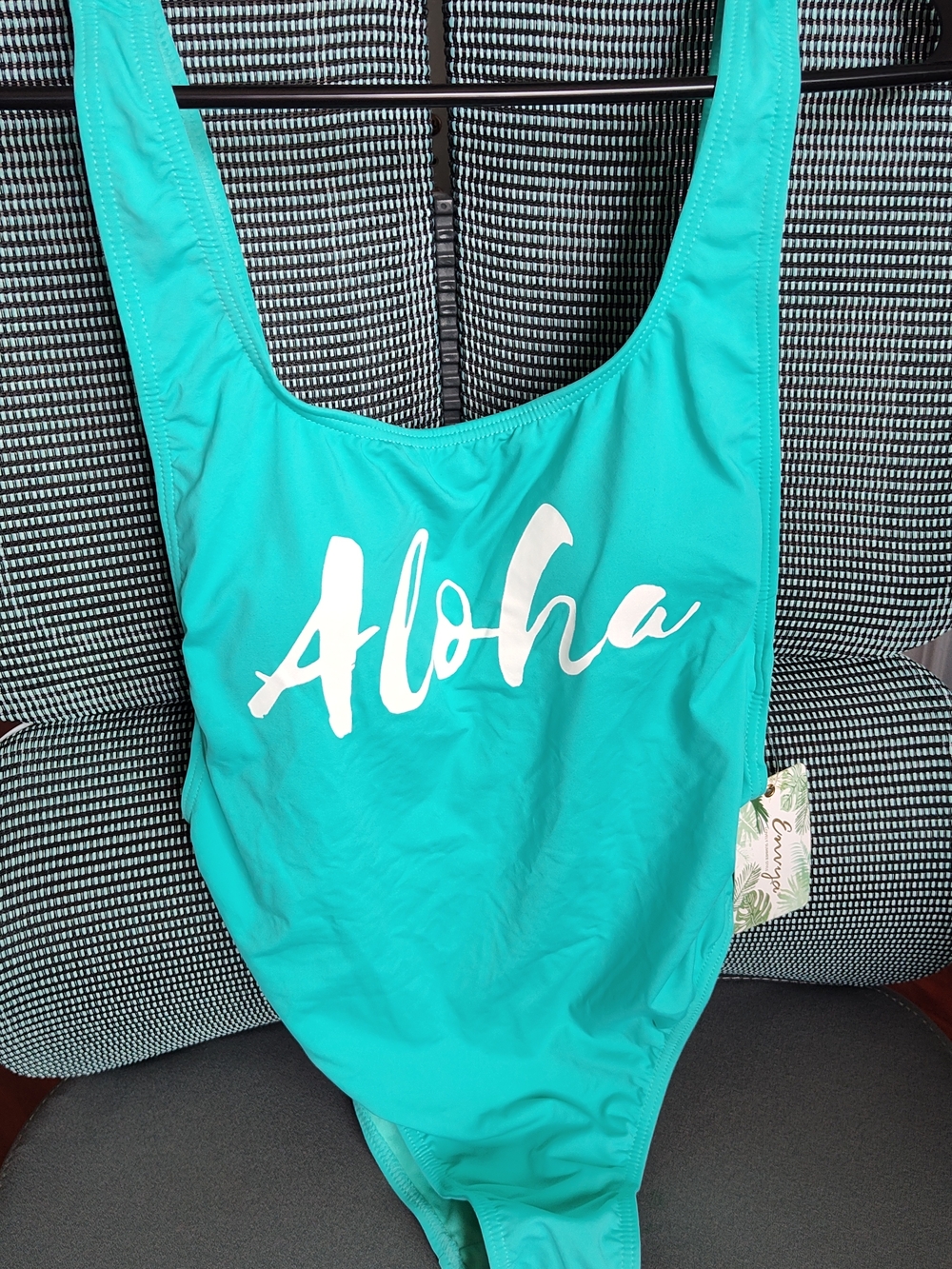 NWT Woman's One Piece Bathing Suit
Side Boob,
Low back size M, turquoise